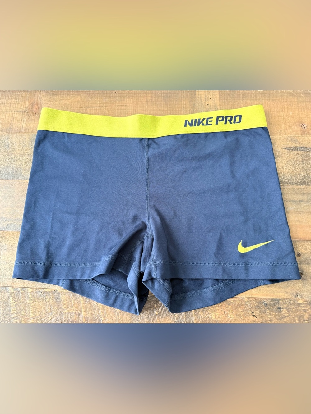 Nike Pro Navy Athletic Shorts with Yellow Waistband